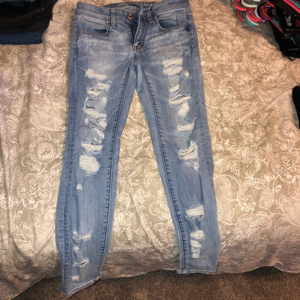 Mid rise medium wash, ripped jeans
